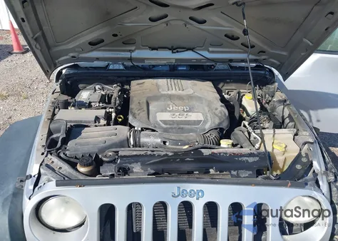 2012 Jeep Wrangler Sport z USA, uszkodzony, nr VIN 1C4AJWAG9CL253031